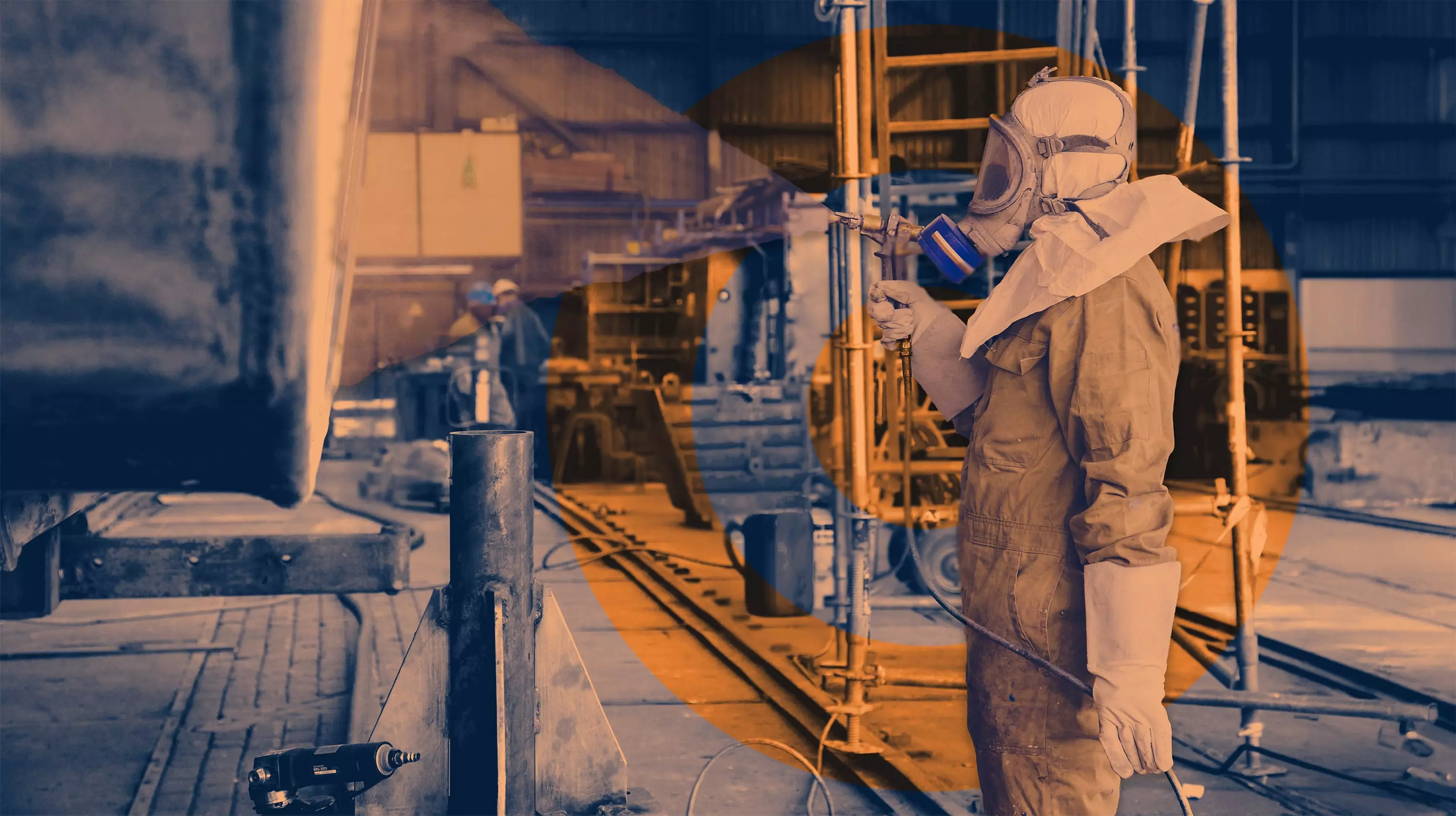 Safe, Skilled, and Precise: Industrial Coating in Action Industrial worker in full protective gear using a spray gun inside a factory or workshop setting.